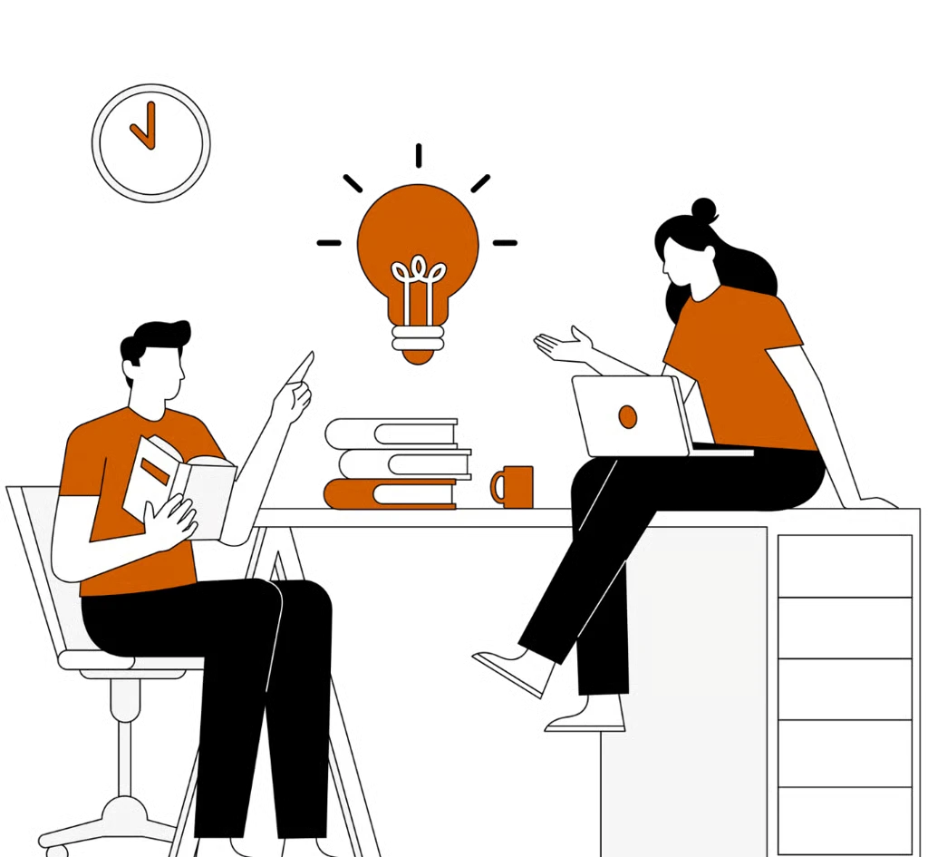 Two colleagues working through a problem together